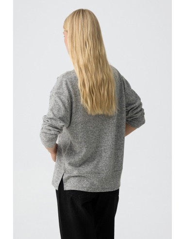 JERSEY CON APLIQUES METÁLICOS